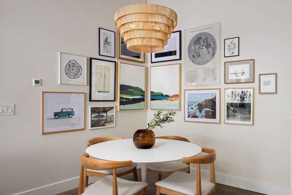 Chic dining nook with coastal-inspired decor, perfect for relaxed meals and late-night conversations.