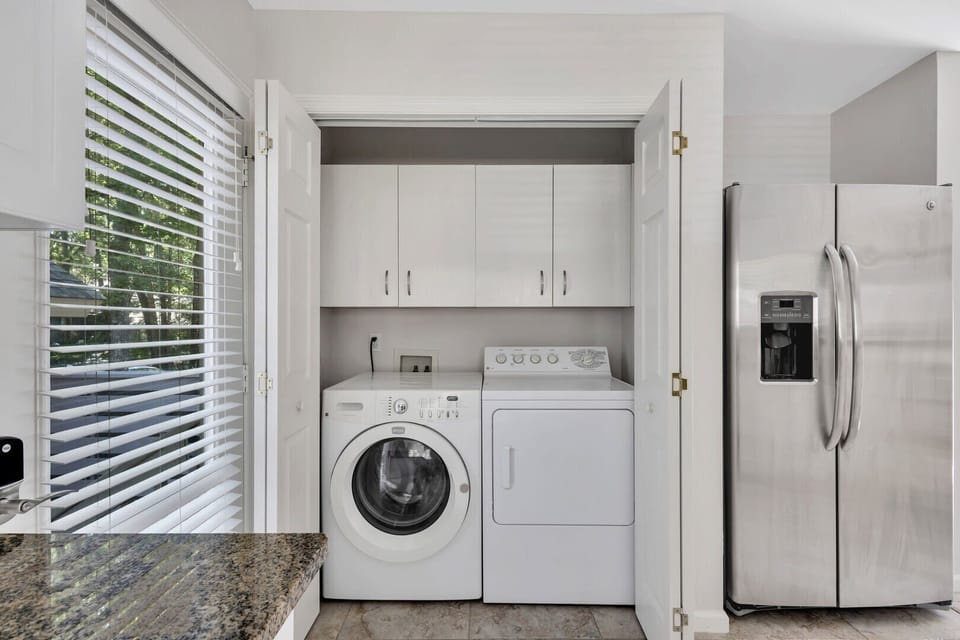 Convenient Laundry Area in Kitchen at 20 Forest Drive