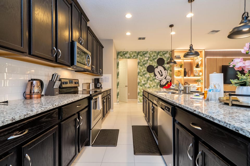 Sleek kitchen with granite countertops and modern appliances