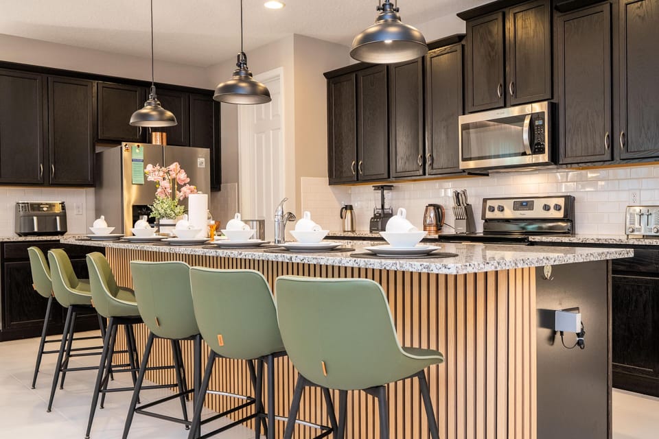 Modern kitchen with spacious island and stylish seating