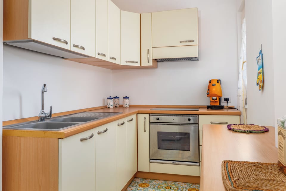 Superior Duplex, Partial Sea View | Private kitchen | Fridge, microwave, oven, stovetop