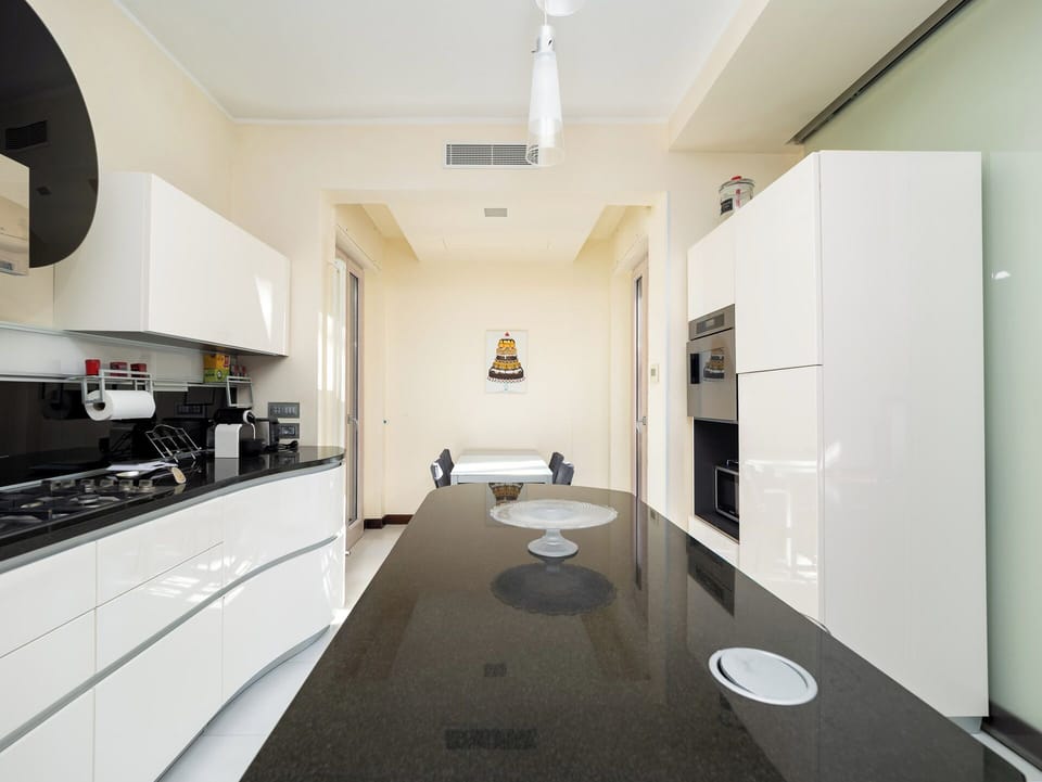 Exclusive Apartment, Balcony, City View | Private kitchen | Fridge, microwave, oven, stovetop