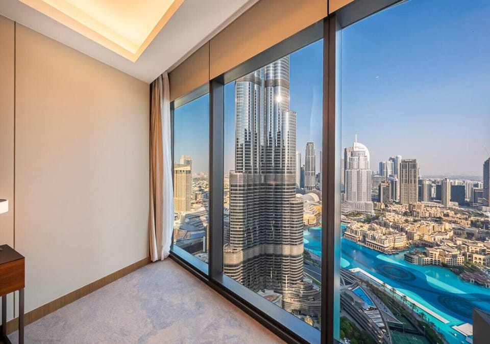 Luxury bedroom with breathtaking skyline views and Burj Khalifa outlook.