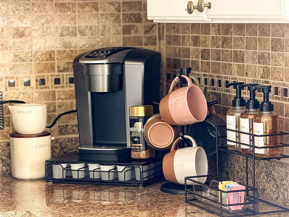 Start your day right at the fully stocked coffee bar with a Keurig, mugs, and all your favorite fixings.