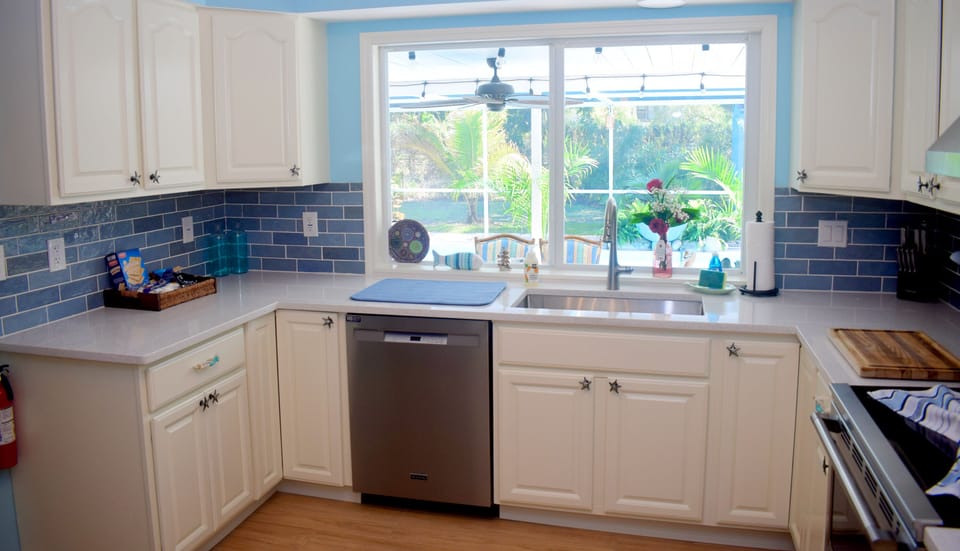 Enjoy looking out the window in the kitchen and watching the kids swim and play.