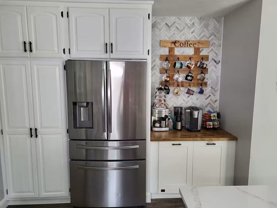 Kitchen with coffee bar. Fresh ground beans and ice maker for hot or cold coffee