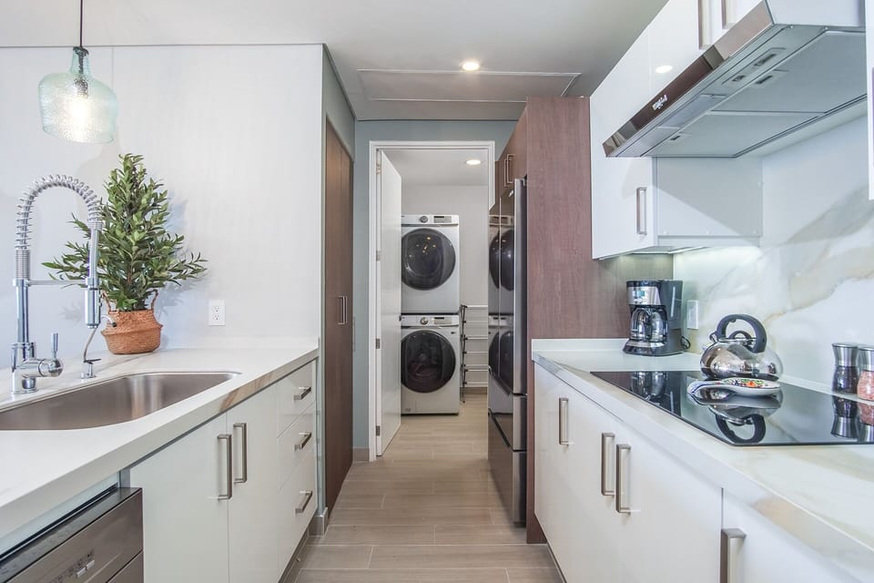 Condo, Multiple Beds, Balcony, Ocean View (Encantame Towers Verano 1002) | Laundry