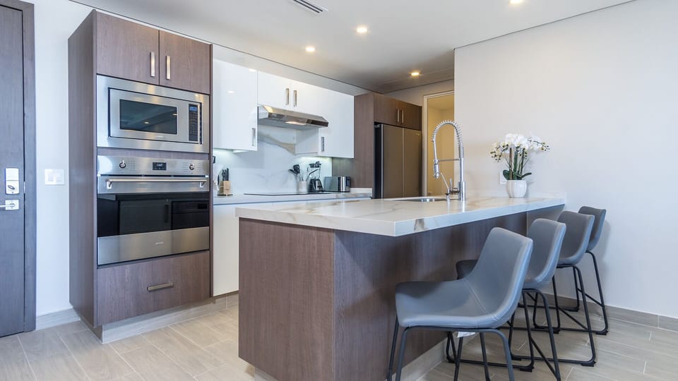 Condo, Multiple Beds, Balcony, Ocean View (Encantame Towers Viento 104) | Private kitchen | Dining table