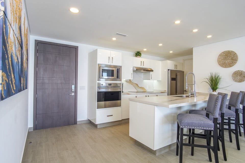 Condo, Multiple Beds, Balcony, Ocean View (Encantame Towers Velero 904) | Private kitchen | Dining table