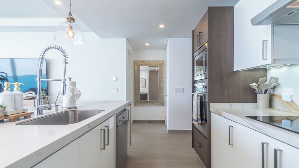 Condo, Multiple Beds, Balcony, Ocean View (Encantame Towers Viento 1905) | Private kitchen | Dining table
