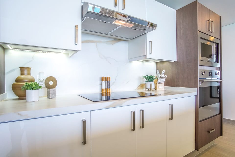 Condo, Multiple Beds, Balcony, Ocean View (Encantame Towers Verano 1405) | Private kitchen | Dining table
