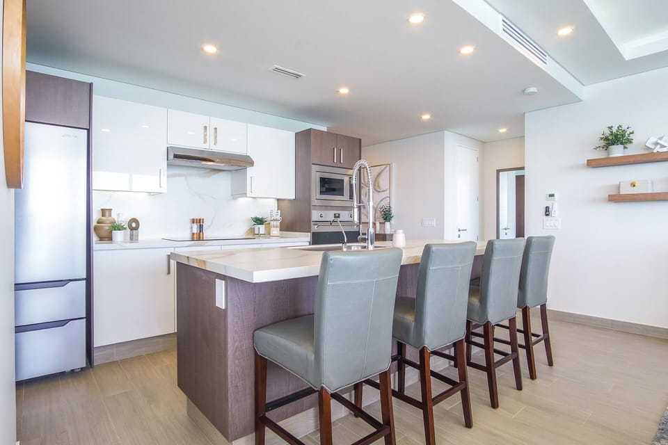 Condo, Multiple Beds, Balcony, Ocean View (Encantame Towers Verano 1405) | Private kitchen | Dining table