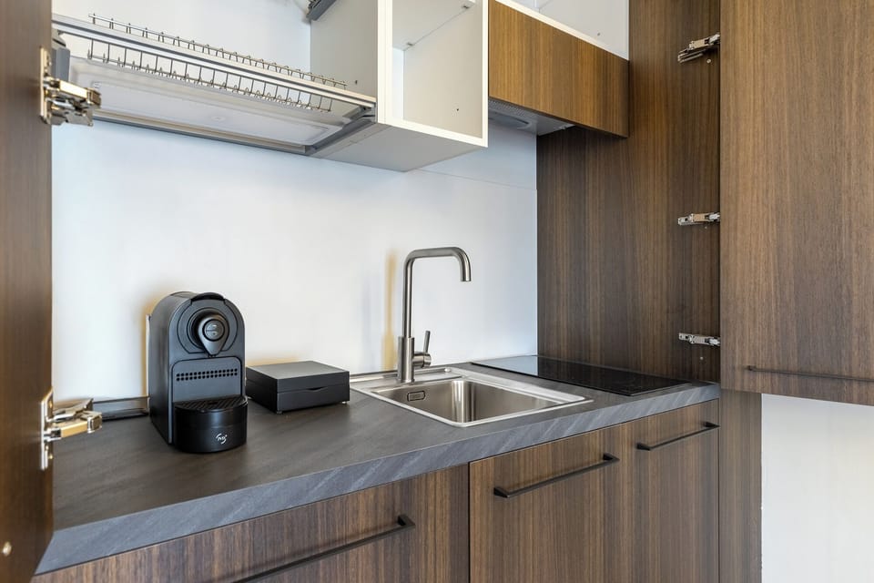 Deluxe Room | Private kitchen | Mini-fridge, espresso maker, coffee/tea maker, electric kettle
