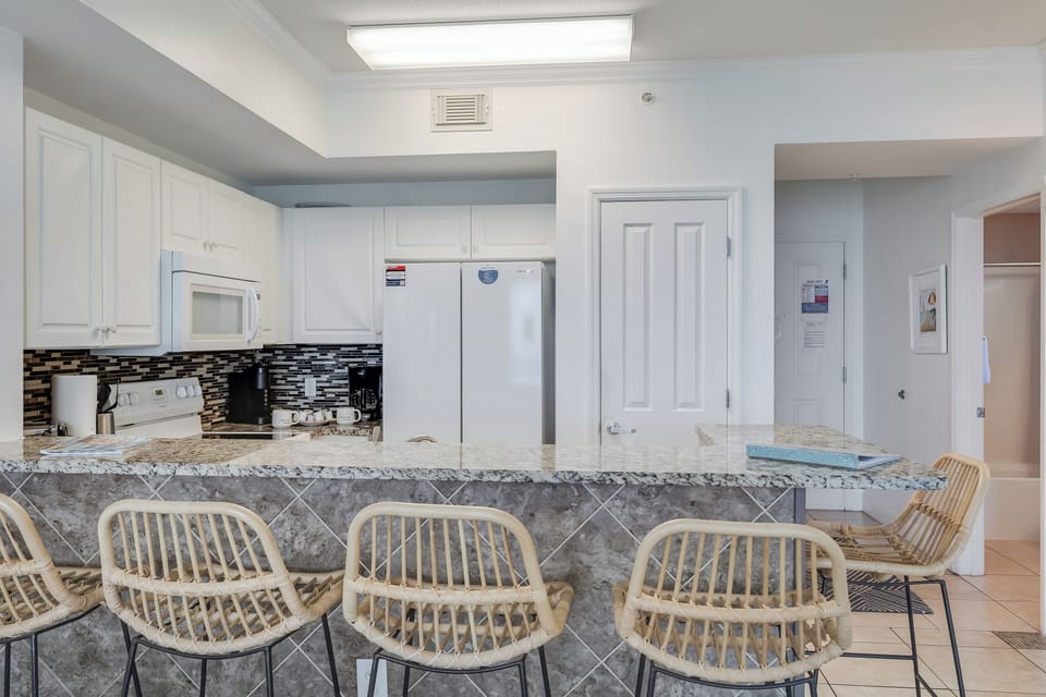 Modern kitchen with marble bar seating-bright stylish and perfect for gatherings