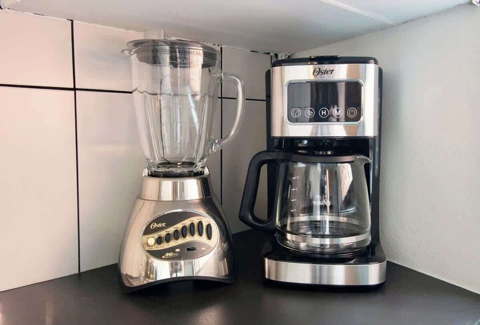 Start your mornings right with a coffee maker and blender, adding comfort and convenience to your stay.