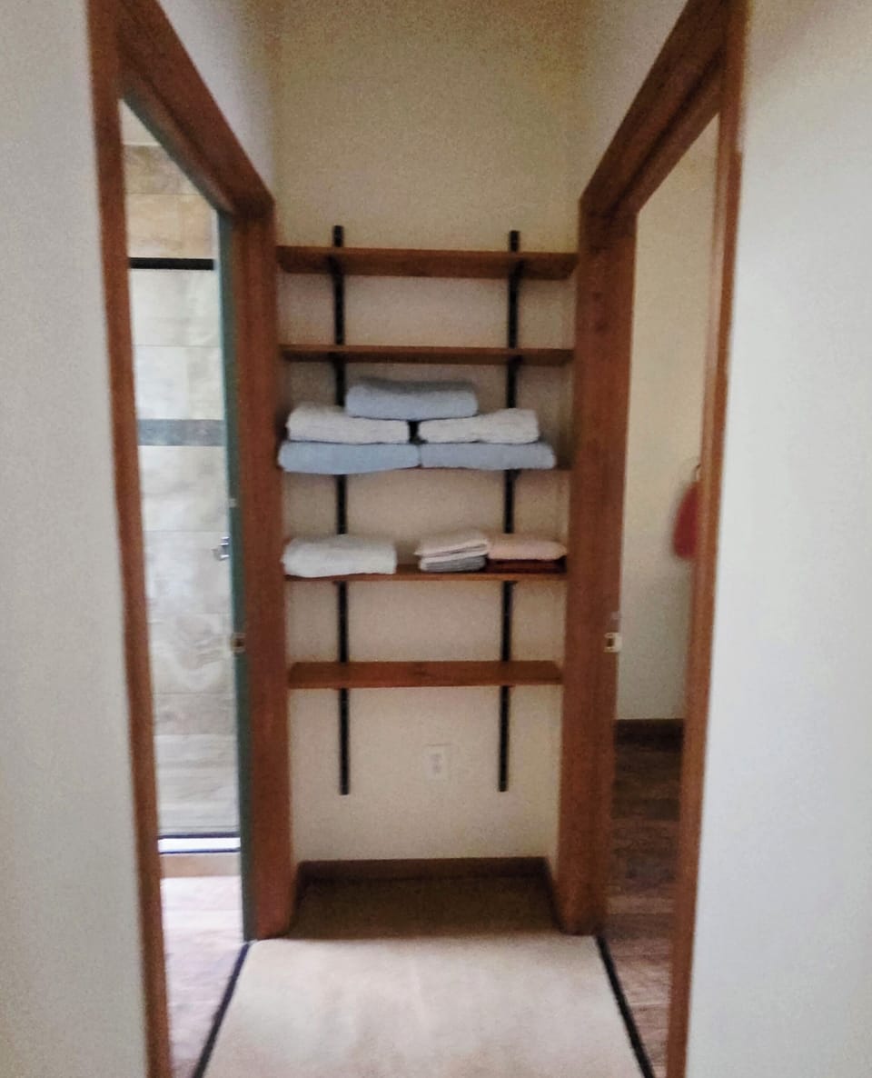 fresh bed sheets and bath towels are provided