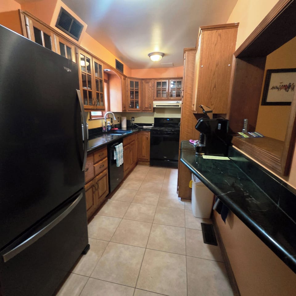 Modern kitchen with upgraded cabinets, countertops