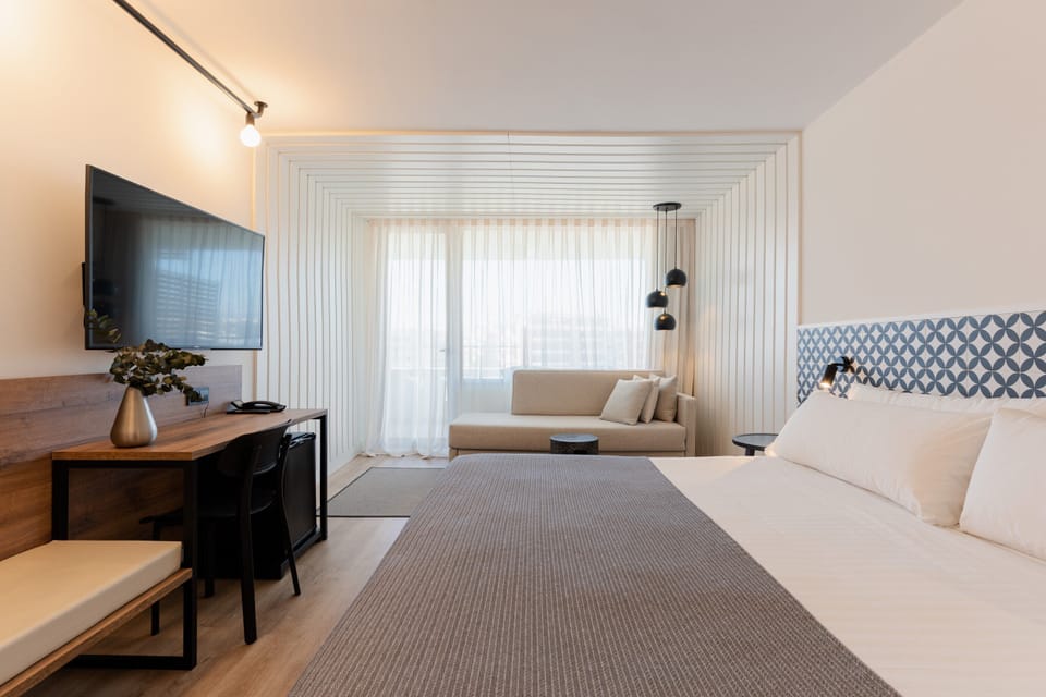 Minibar, desk, laptop workspace, blackout drapes