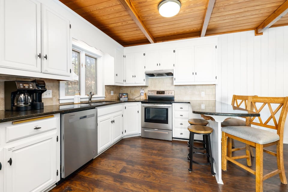 Large kitchen with all the kitchenware you'll need during your stay. Tons of counter space