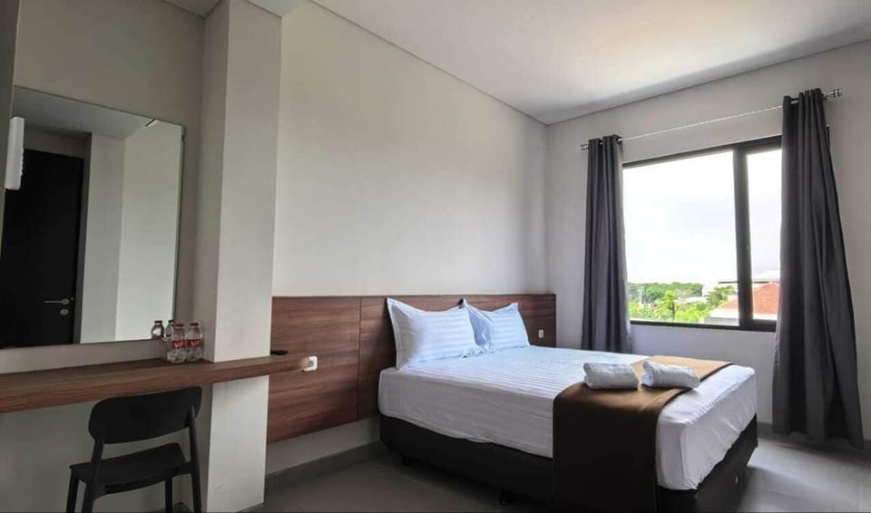 Deluxe Room | Desk, laptop workspace, free WiFi, bed sheets