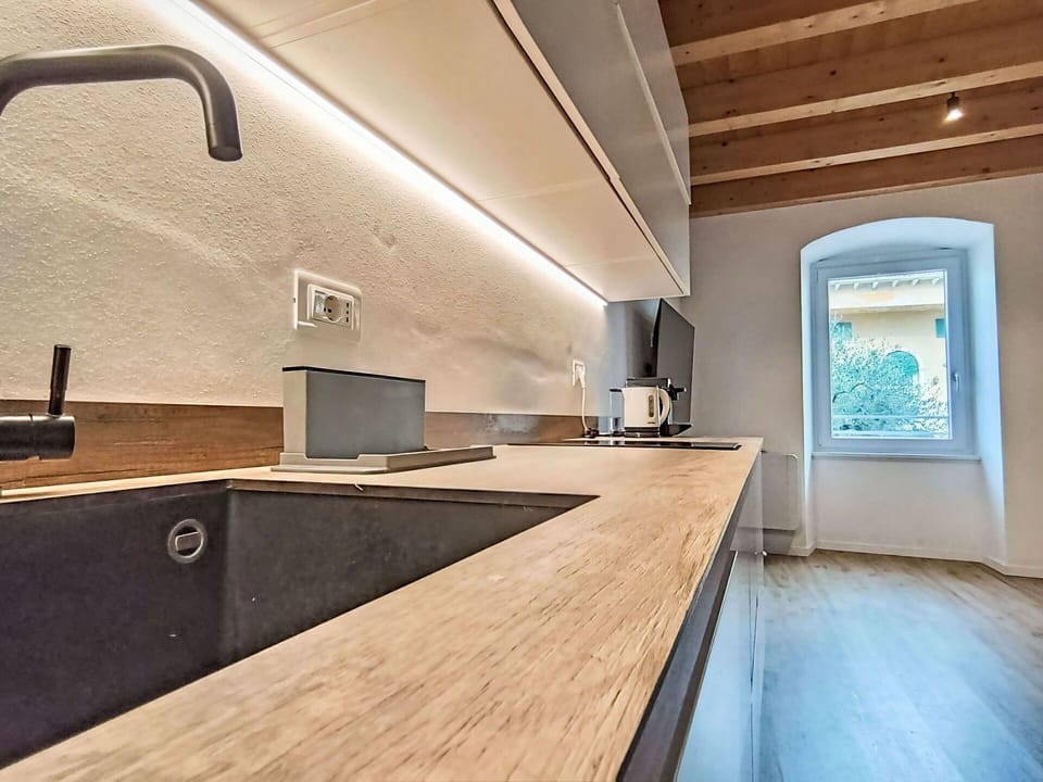 Flooring, Wood, Countertop, Interior Design, Floor, Ceiling, Kitchen, Lighting, Wood Flooring, Home