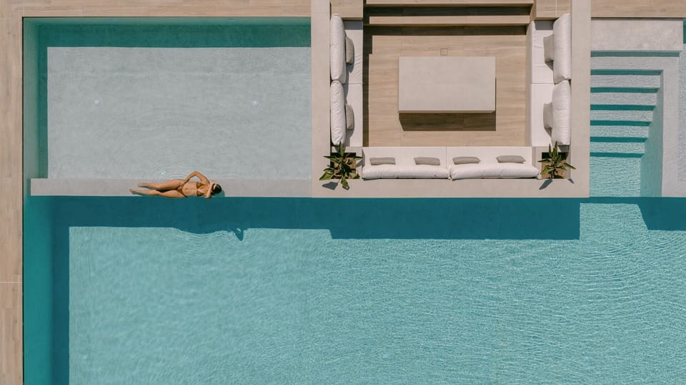 Serene moments by the crystal pool, where luxury meets tranquility.