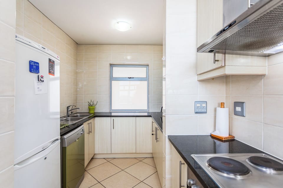 Deluxe Apartment, Balcony, Partial Sea View | Private kitchen | Full-size fridge, microwave, oven, stovetop