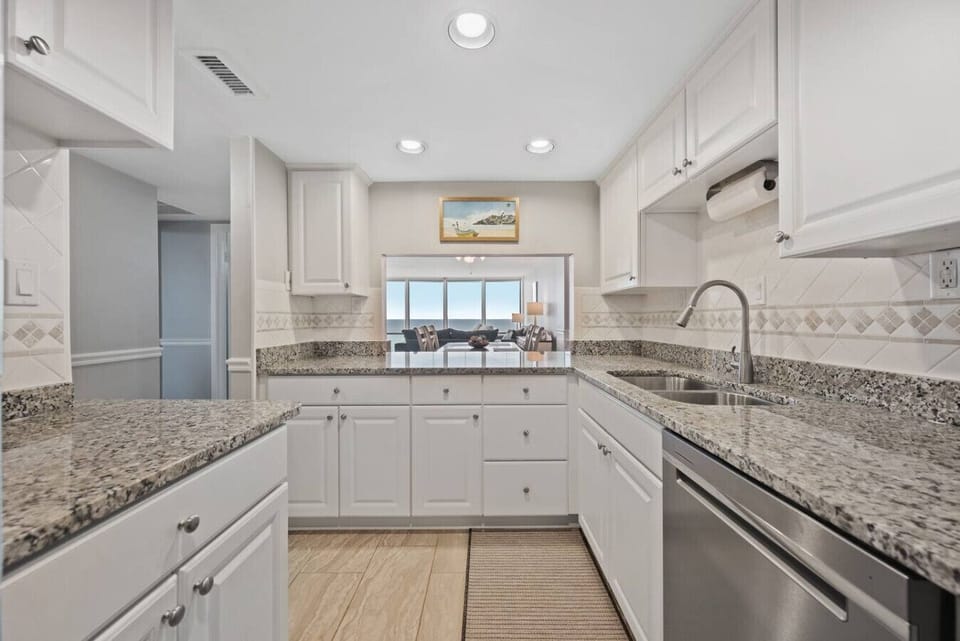 Bright and inviting, the kitchen is where mornings start slow and conversations flow.