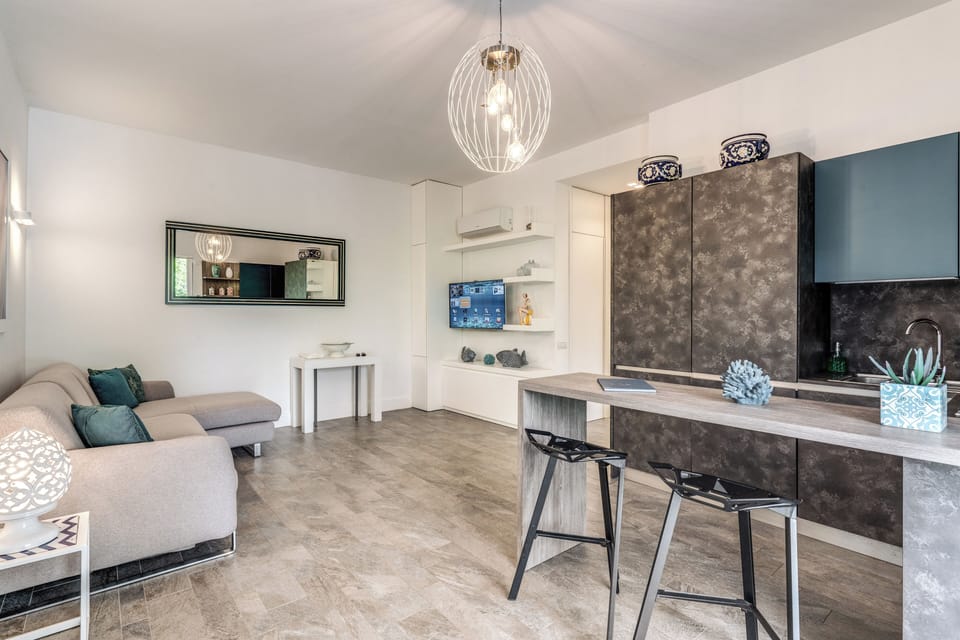 Apartment, Private Pool | Living area | Flat-screen TV