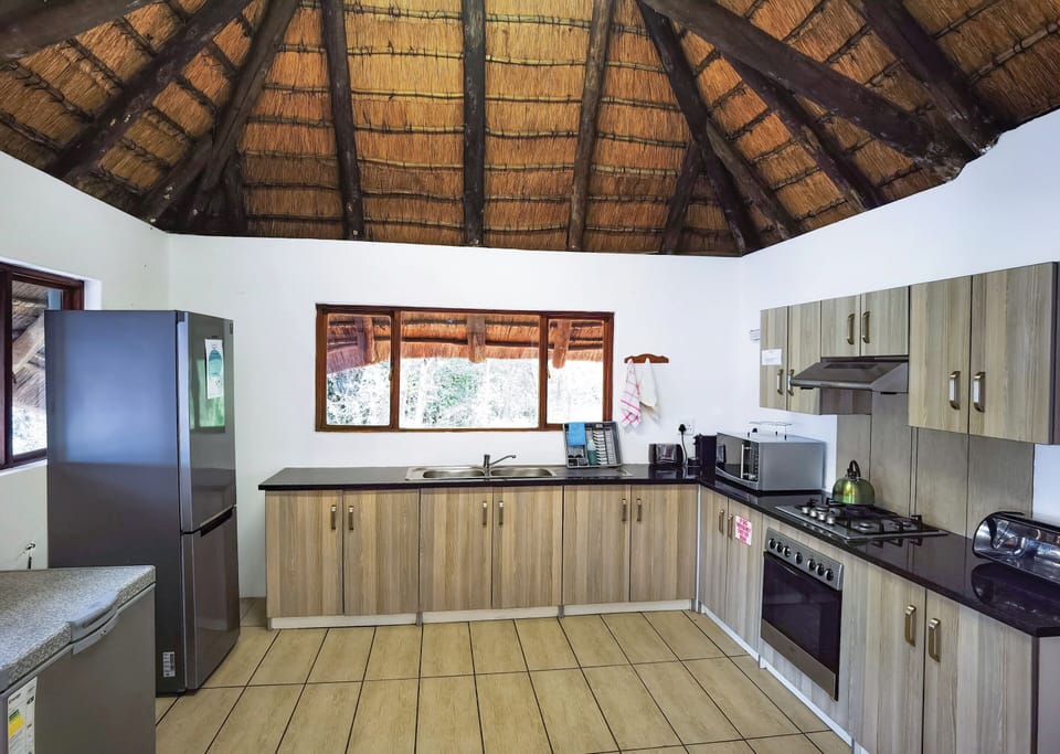 Standard Chalet, 4 Bedrooms | Private kitchen | Full-size fridge, microwave, oven, stovetop
