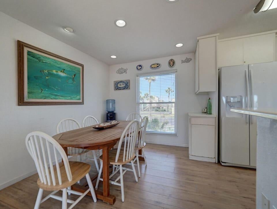 Bright dining area with beachy touches and natural light