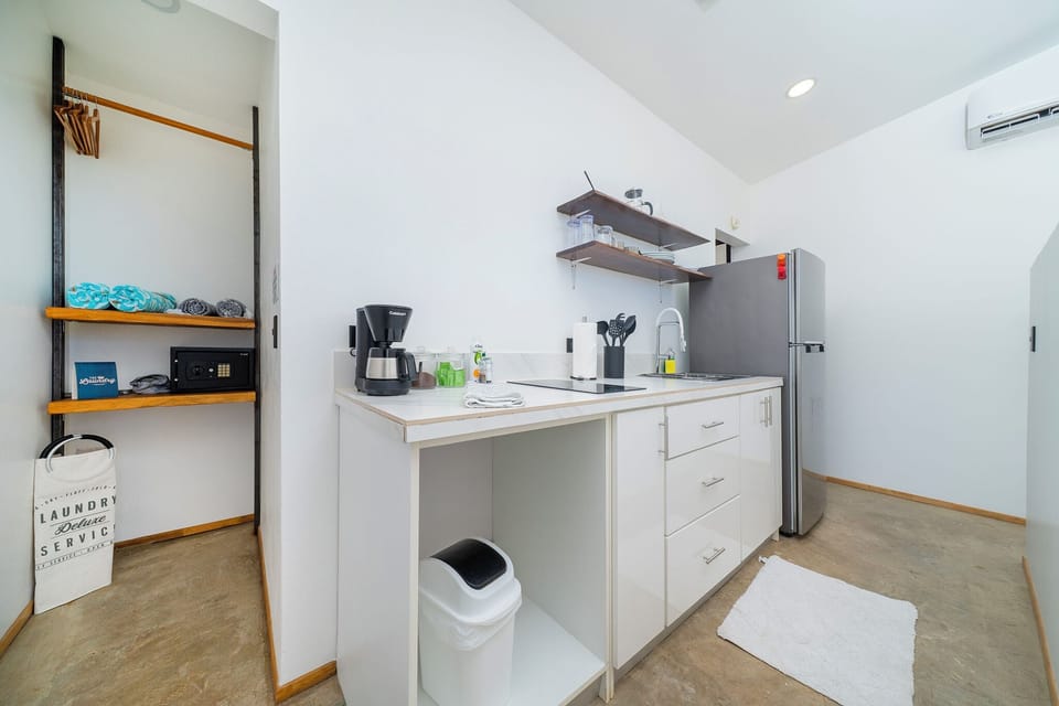 Full-size fridge, stovetop, coffee/tea maker, electric kettle