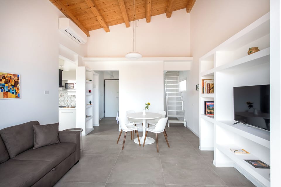 Apartment, 1 Bedroom, Balcony | Living area | 30-inch TV with satellite channels