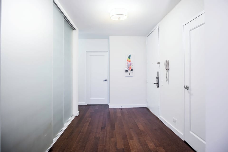 Family Apartment, 3 Bedrooms, Kitchen, City View | Living area | 55-inch Smart TV with cable channels