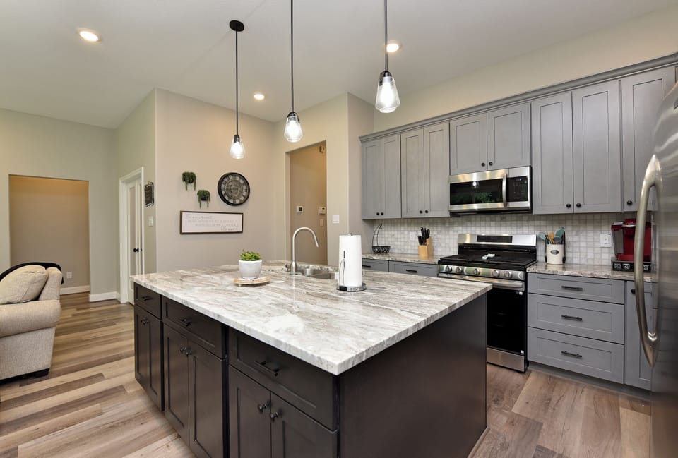 The open kitchen has plenty of room to move around, with a large island.