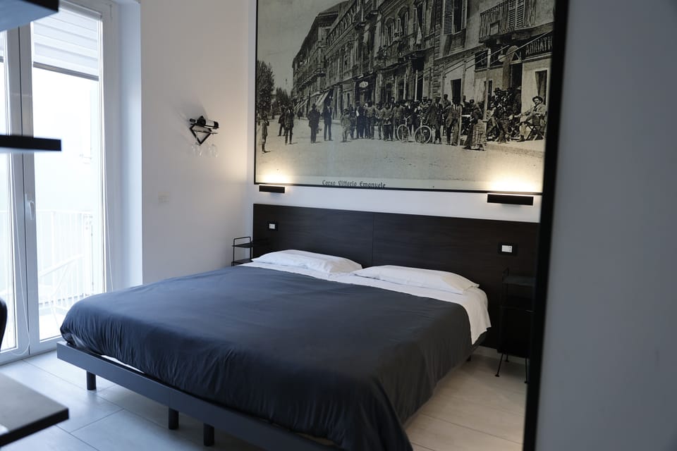 Comfort Double or Twin Room, 1 Queen Bed, Private Bathroom, City View | In-room safe, laptop workspace, soundproofing, iron/ironing board