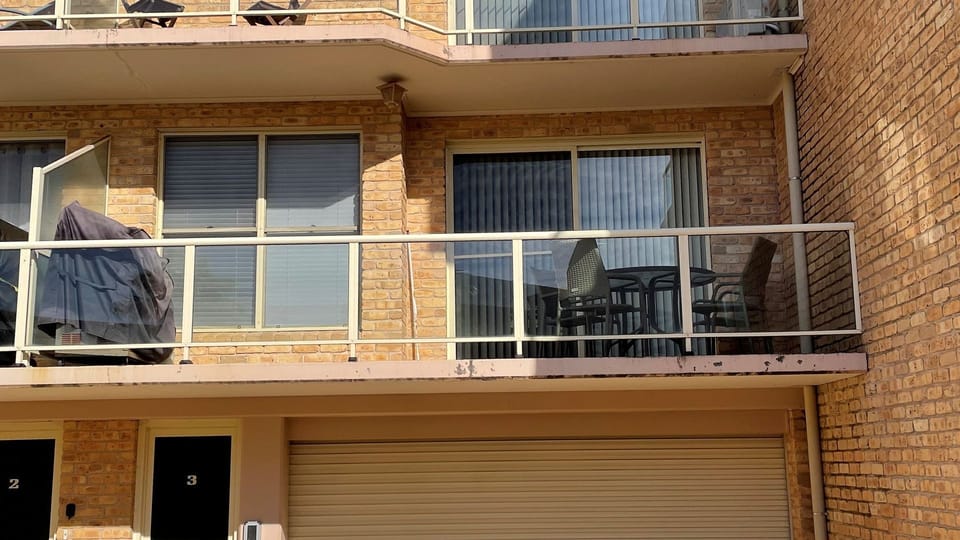 View of balcony from carpark. 