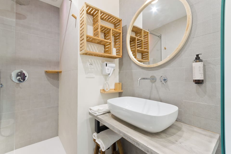 Comfort Triple Room, Non Smoking, Balcony | Bathroom | Shower, eco-friendly toiletries, hair dryer, slippers