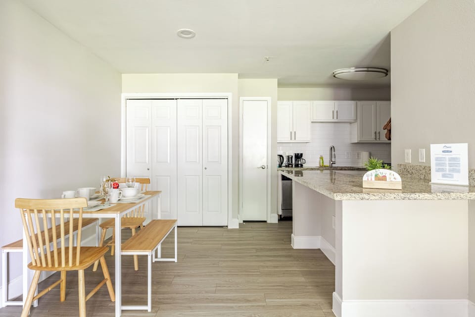 Bright open kitchen and dining area with modern finishes