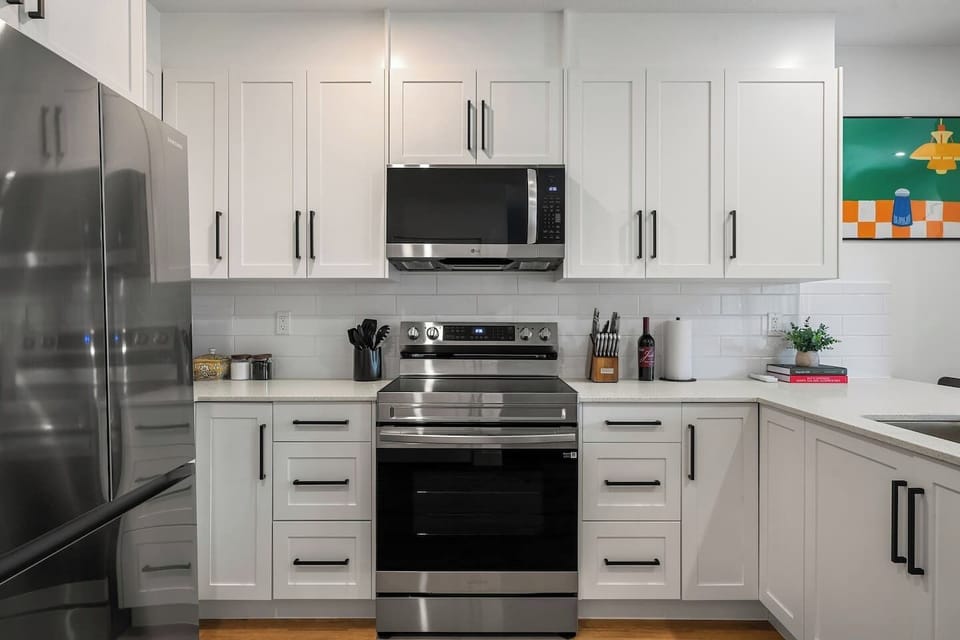 Full kitchen with a drip coffee maker, blender, crockpot and kid`s plates & utensils. Plenty of seating for 4 at the island.