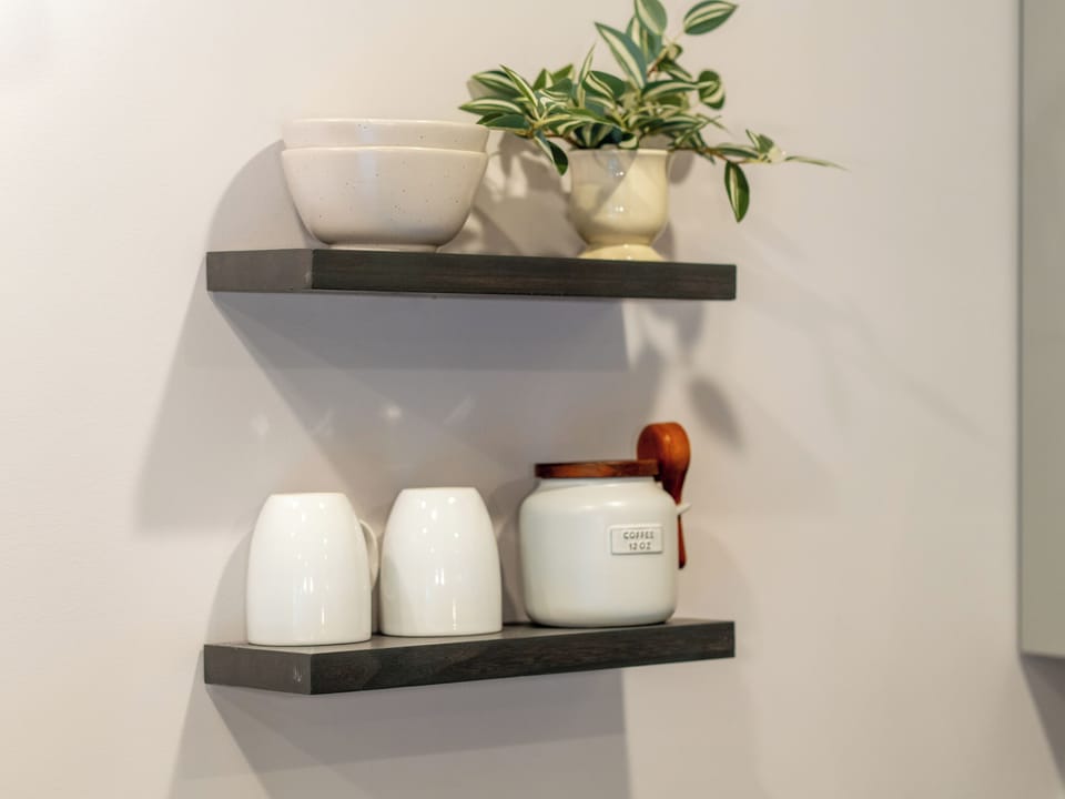 Styled floating shelves with coffee station charm and modern decor