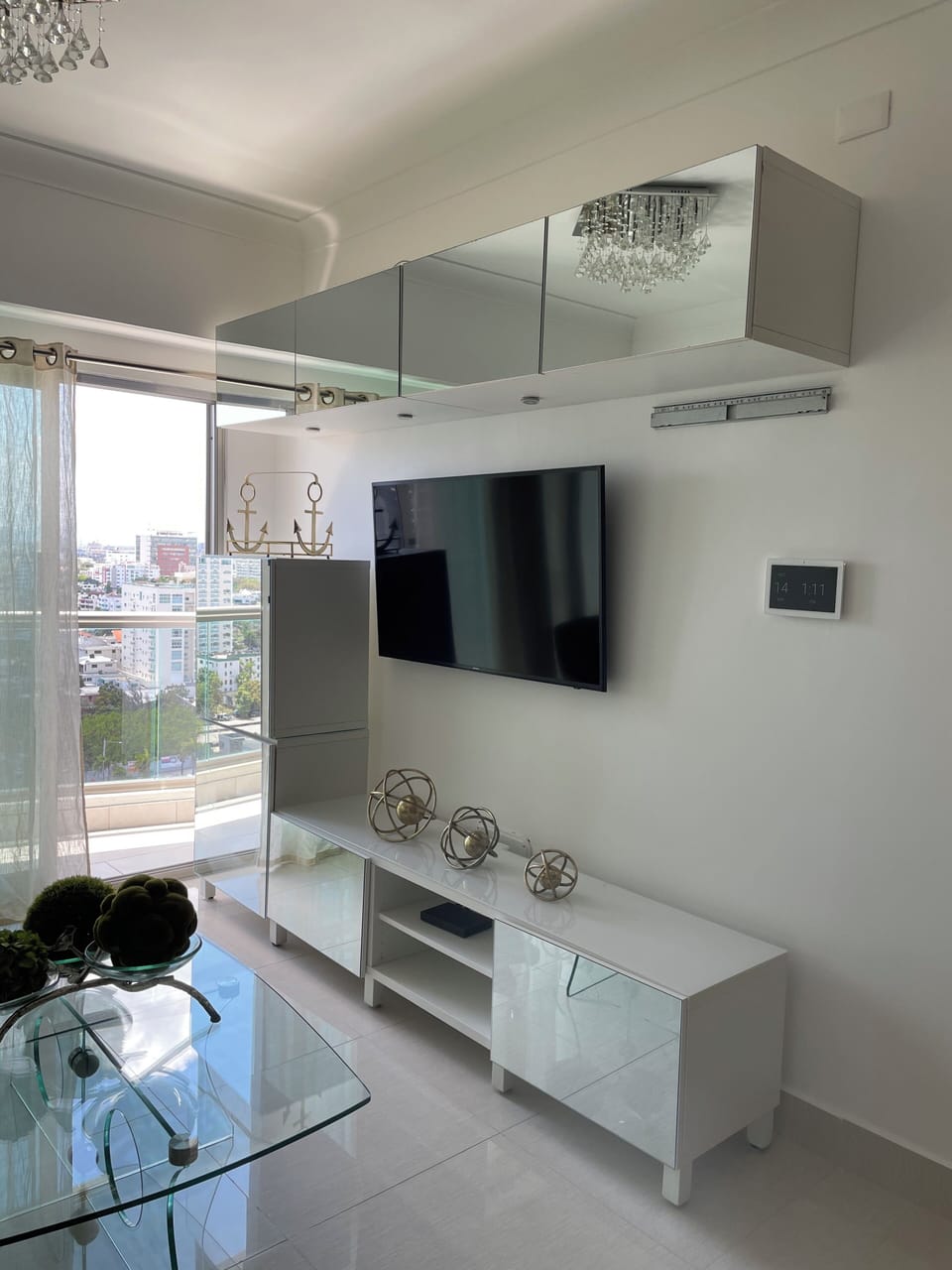 Deluxe Apartment, Balcony, City View | Living area | 55-inch LED TV with digital channels