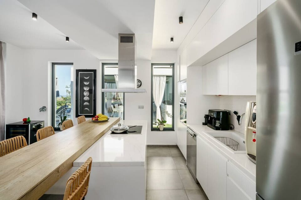 Fully equipped kitchen with modern appliances, cookware, and essentials—ideal for guests who enjoy home-cooked meals.