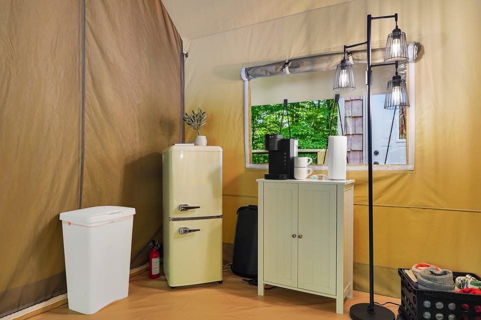 Kitchenette area with mini fridge and coffee station