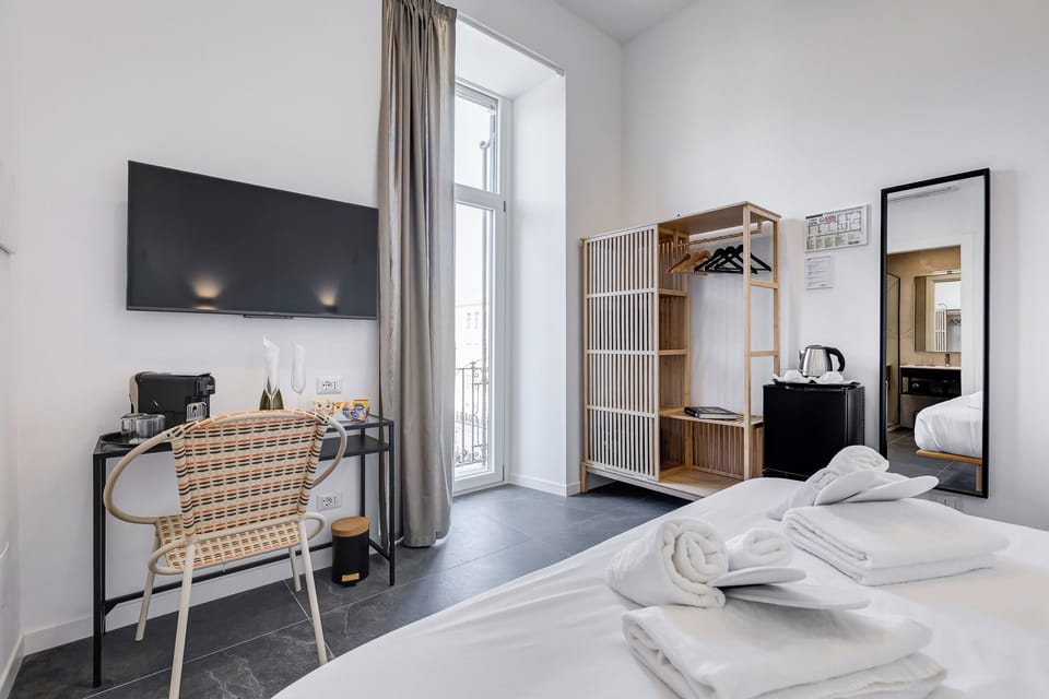 Deluxe Double Room | In-room safe, desk, laptop workspace, blackout drapes