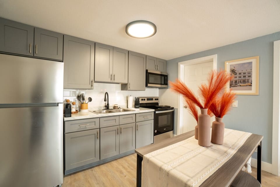 Updated kitchen featuring stainless steel appliances and all essentials.