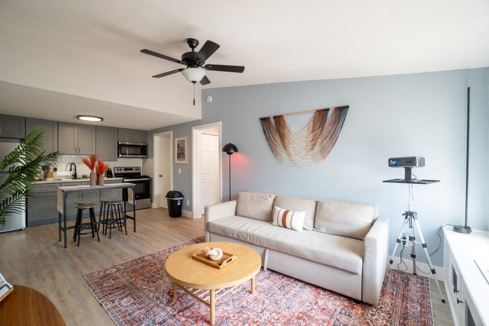 Modern open floor plan with fully equipped kitchen and lounge