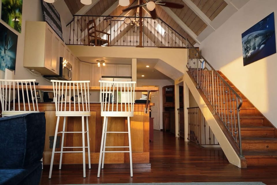 A wonderful view of the loft from below. That shows the beautiful vintage features of the house.