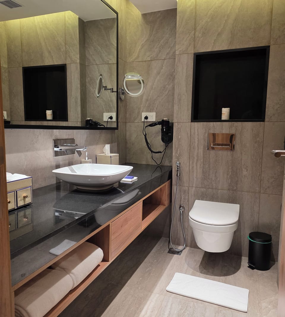 Shower, free toiletries, hair dryer, slippers