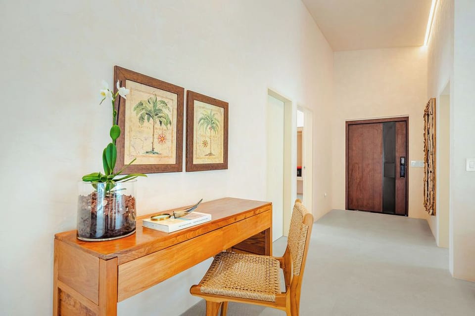 Our dedicated, stylish workspace provides a quiet corner for productivity, bathed in natural light. Then, step through the striking entryway to unwind in our beautiful living spaces. Welcome to your ideal blend of focus and relaxation!